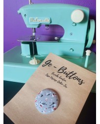 Bouton floral gris
